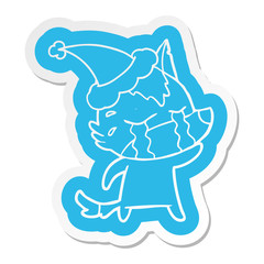 cartoon  sticker of a crying wolf wearing santa hat