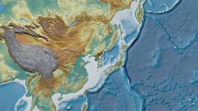 North Korea area presented against the global relief map in the Patterson Cylindrical projection with animated oblique transformation