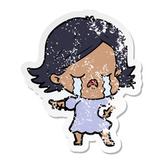 distressed sticker of a cartoon girl crying and pointing
