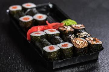 Maki in a takeaway container