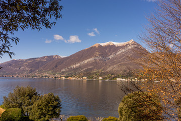 Italy, Bellagio, Lake Como, a body of water with a mountain in the background