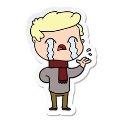 sticker of a cartoon man crying wearing winter scarf