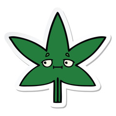sticker of a cute cartoon marijuana leaf