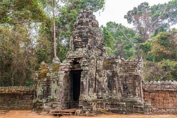 Gopuram (entrance) with face tower in the fourth enclosure wall of Banteay Kdey temple, Cambodia