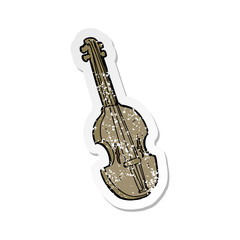Obraz premium retro distressed sticker of a cartoon violin