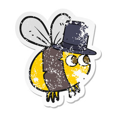 retro distressed sticker of a cartoon bee in top hat