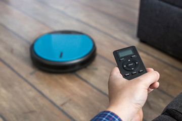 Holding robot vacuum cleaner remote control control