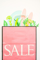 Easter sale, package with egg, rabbit ears.