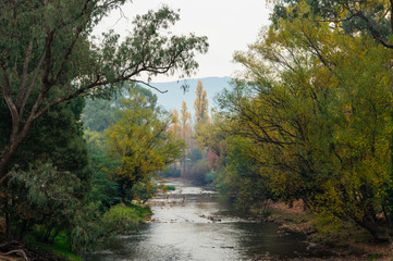 Smoke haze hangs over the Ovens River in Bright in northern Australia.