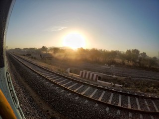 Sun rise along the train tracks