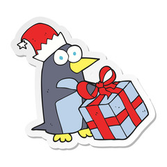 sticker of a cartoon christmas penguin