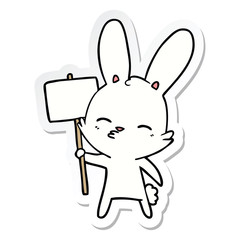 sticker of a curious bunny cartoon with placard