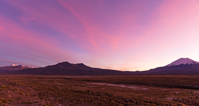 Sunset in Andes. Parinacota volcano. High Andean landscape in the Andes.