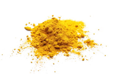 Turmeric powder pile isolated on white background