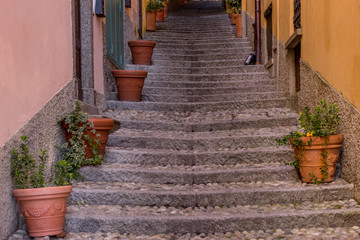 Fototapeta na wymiar Italy, Bellagio, Lake Como, stone stairs in an alley