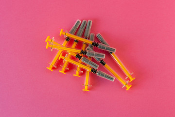 Syringe Pink Background