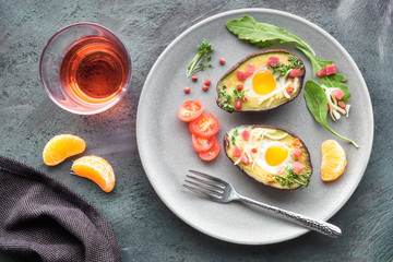 Keto diet dish: Avocado boats with ham cubes, quail eggs, cheese