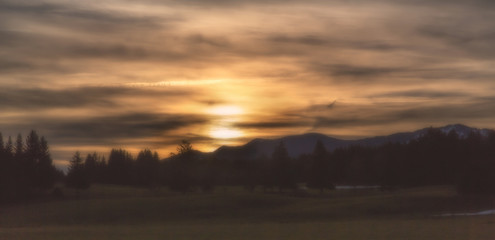 Romantic sunrise with dramatic sky and clouds
