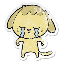 distressed sticker of a cartoon crying dog