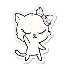 distressed sticker of a cute cartoon cat with bow