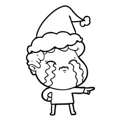 Obraz premium line drawing of a man crying wearing santa hat