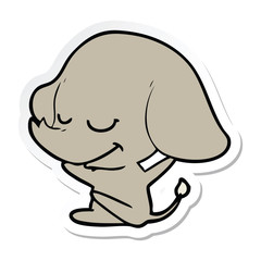 sticker of a cartoon smiling elephant