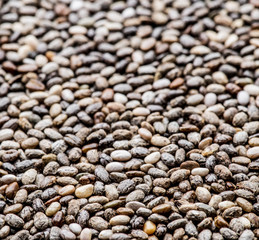 Heap of Chia seeds. Food background.