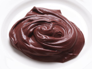 Hot chocolate swirl isolated on white.
