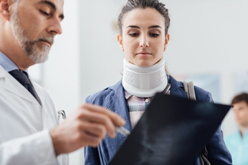 Doctor examining a patient's x-ray