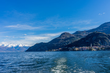 Italy, Bellagio, Lake Como with snow capped alps mountain