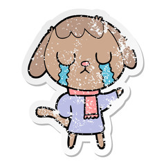 distressed sticker of a cute cartoon dog crying