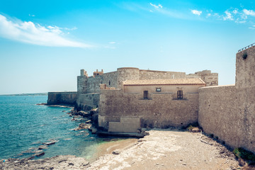 Fototapeta na wymiar Castello Maniace – ancient castle in Ortygia (Ortigia) Island, Syracuse, Sicily, Italy, traditional architecture.