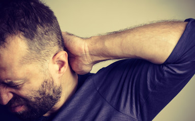 Fototapeta premium Man having neck ache