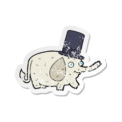 retro distressed sticker of a cartoon elephant wearing top hat
