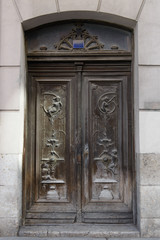 antique wooden door in a stone wall