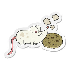 sticker of a cute cartoon mouse and cookie