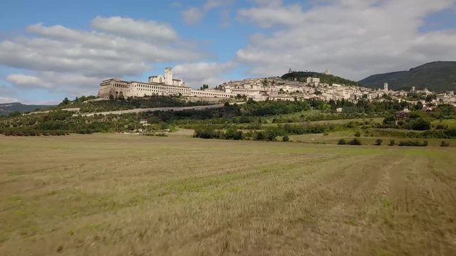 Flying towards the Italian city of Assisi in Umbria the green heart of Italy.