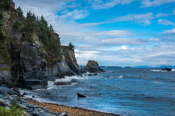 Sound of the waves in the Kodiak. Cliffs and rocks on the shore