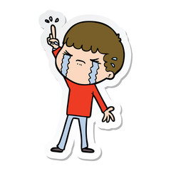 sticker of a cartoon man crying