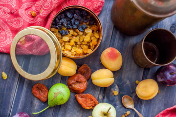 Set of fresh fruits and berries on wooden background