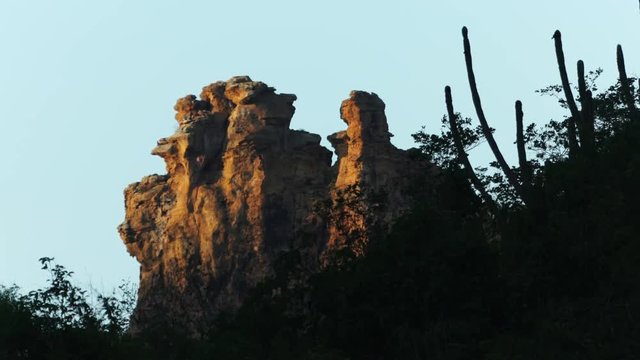 Rock cliff with early morning sunlight at Caatinga desert, Brazil