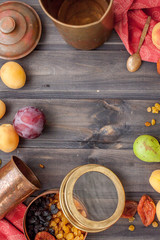Set of fresh fruits and berries on wooden background
