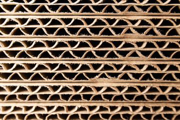 Many stacked corrugated paper.