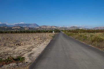 Road, fields and mountains, Crete, Greece