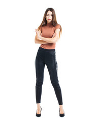 Full body, Young beautiful brunette woman in black pants