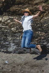 Naklejka premium attractive middle aged woman on the beach