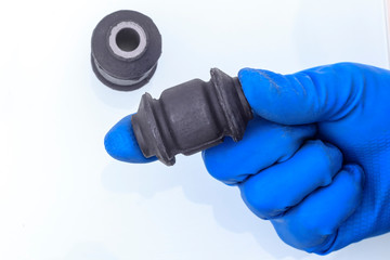 Hob front suspension. On the lever is set small. the master holds gloves in his fingers. without...