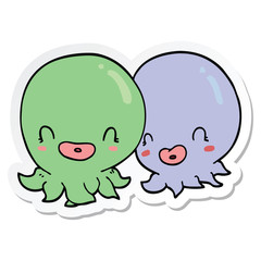sticker of a two cartoon octopi