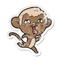 distressed sticker of a crazy cartoon monkey