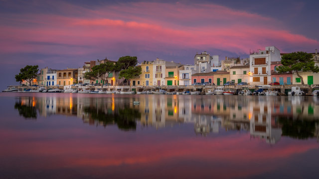 Porto Colom in mallorca, sunrise over fishing boats in Spain